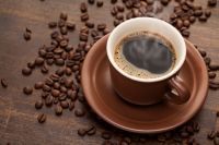Consumul zilnic de cafea reduce cu 20% riscul cancerului de piele